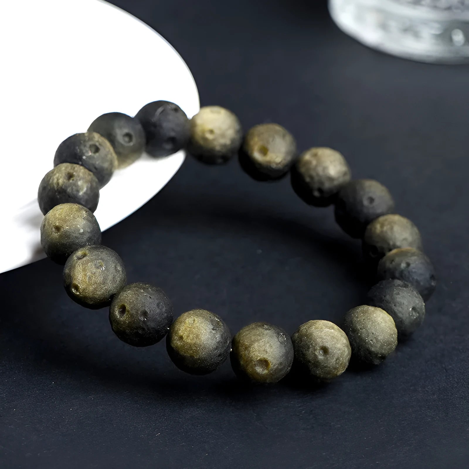 Natural obsidian crater ball bracelet with ground texture beads in silver or golden meteorite colours