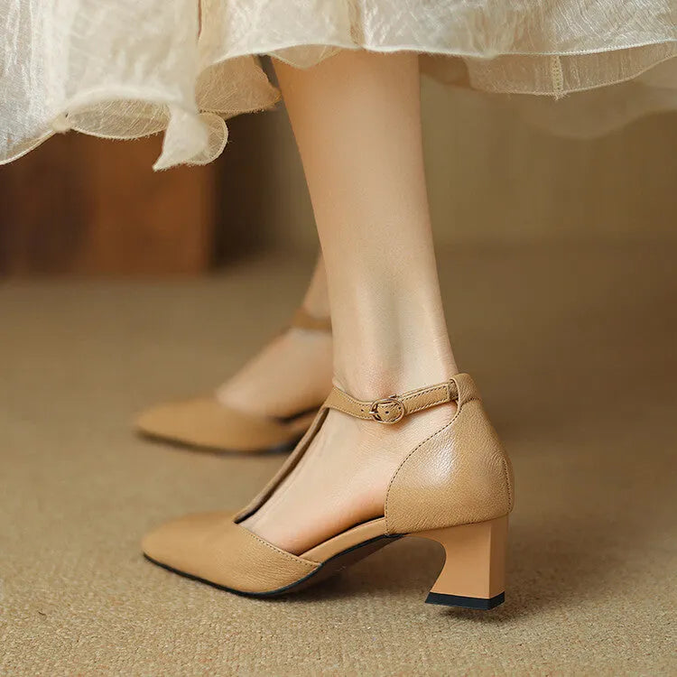 Wine red sheepskin leather square toe high heels with a chunky heel and silver buckle closure.