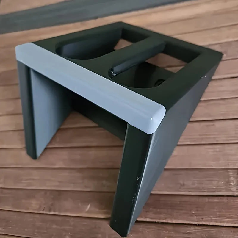 Black plastic pistol stand with punk-style detailing measuring 10.85 cm