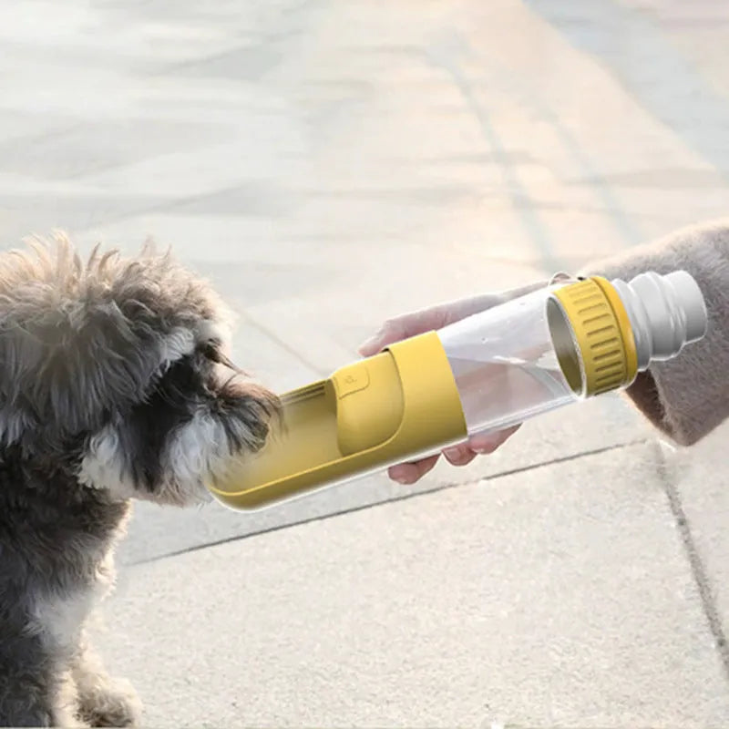 Portable dog water bottle with integrated drinking bowl in dark blue colour