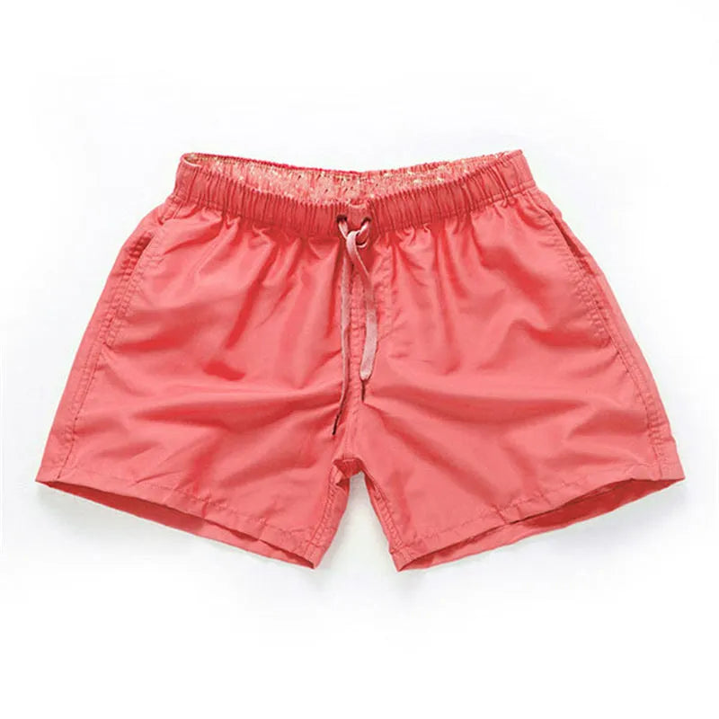Men's straight leg beach shorts in polyester fabric available in multiple colours and sizes up to 4XL