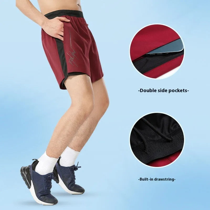 Men's solid colour basketball shorts in polyester fabric with low waist cut