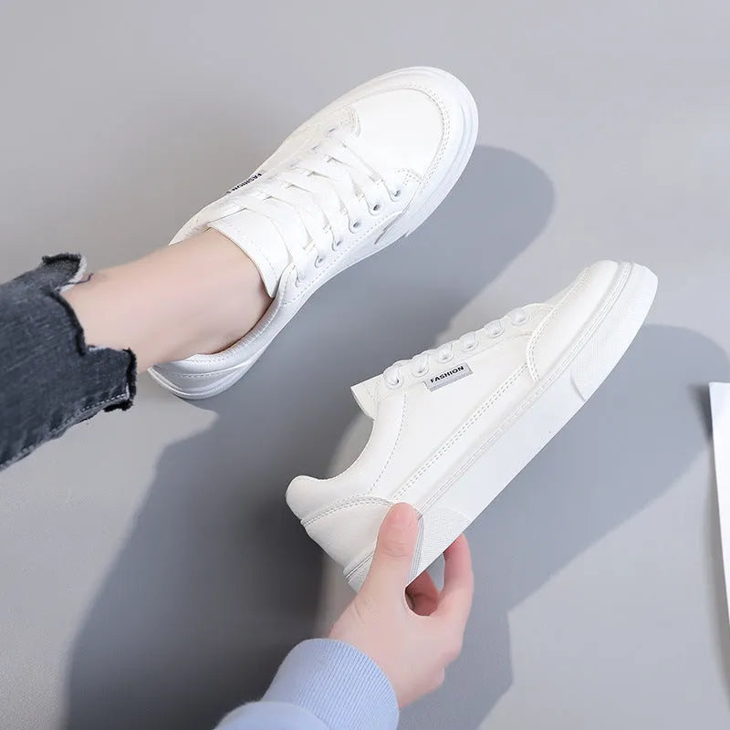 Korean-style women's low-top sneakers in white or brown with artificial PU upper.