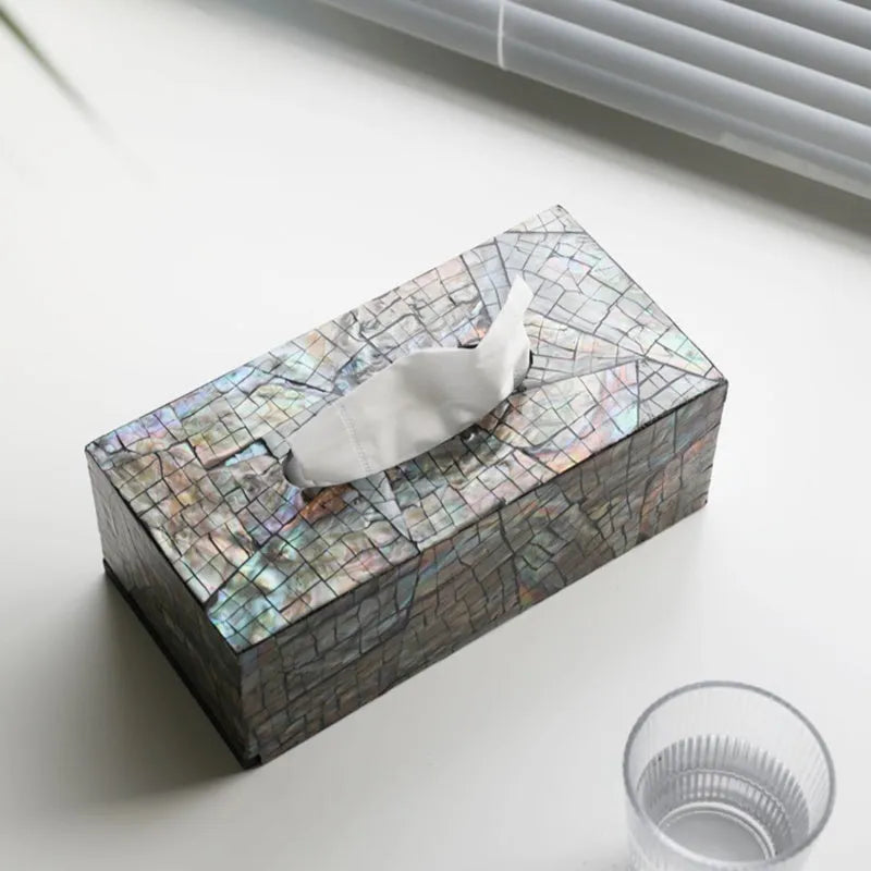 Black square and rectangular natural shell tissue boxes with removable storage organisers.