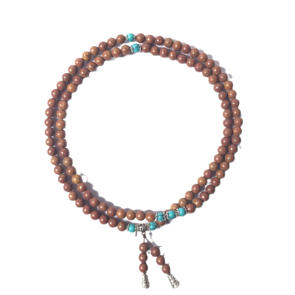 108-bead Lvzhu stone bracelet with geometric shaping and 5-6mm diameter beads on wrist