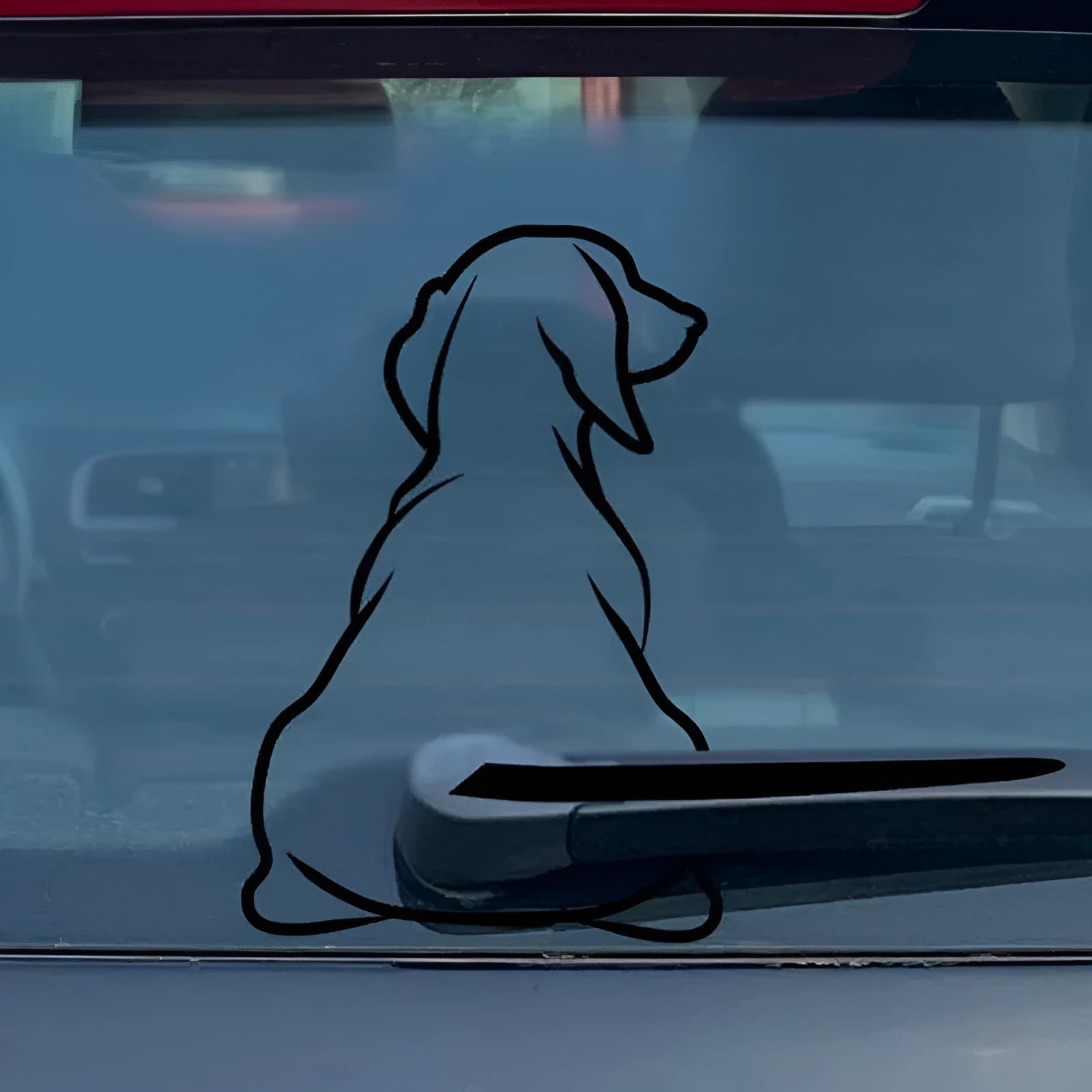 Cartoon dog design car sticker for rear window portraying a wiper, in black or white.