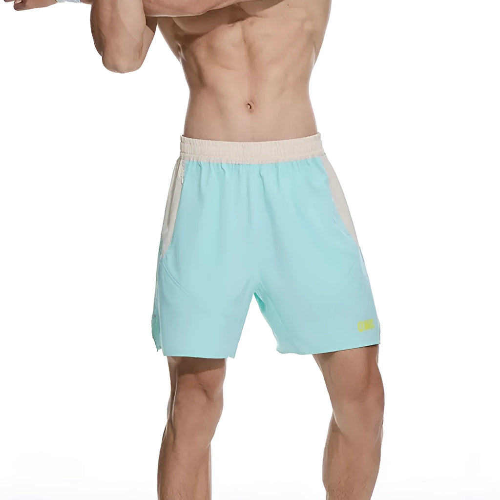 Men's loose grey workout shorts with elastic waist and lace-up closure for gym training
