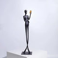 Black cast aluminium reading woman desktop sculpture modern minimalist decor
