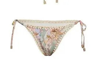 Women's floral bikini swimsuit set with top, briefs, and skirt in creamy-white beige colour