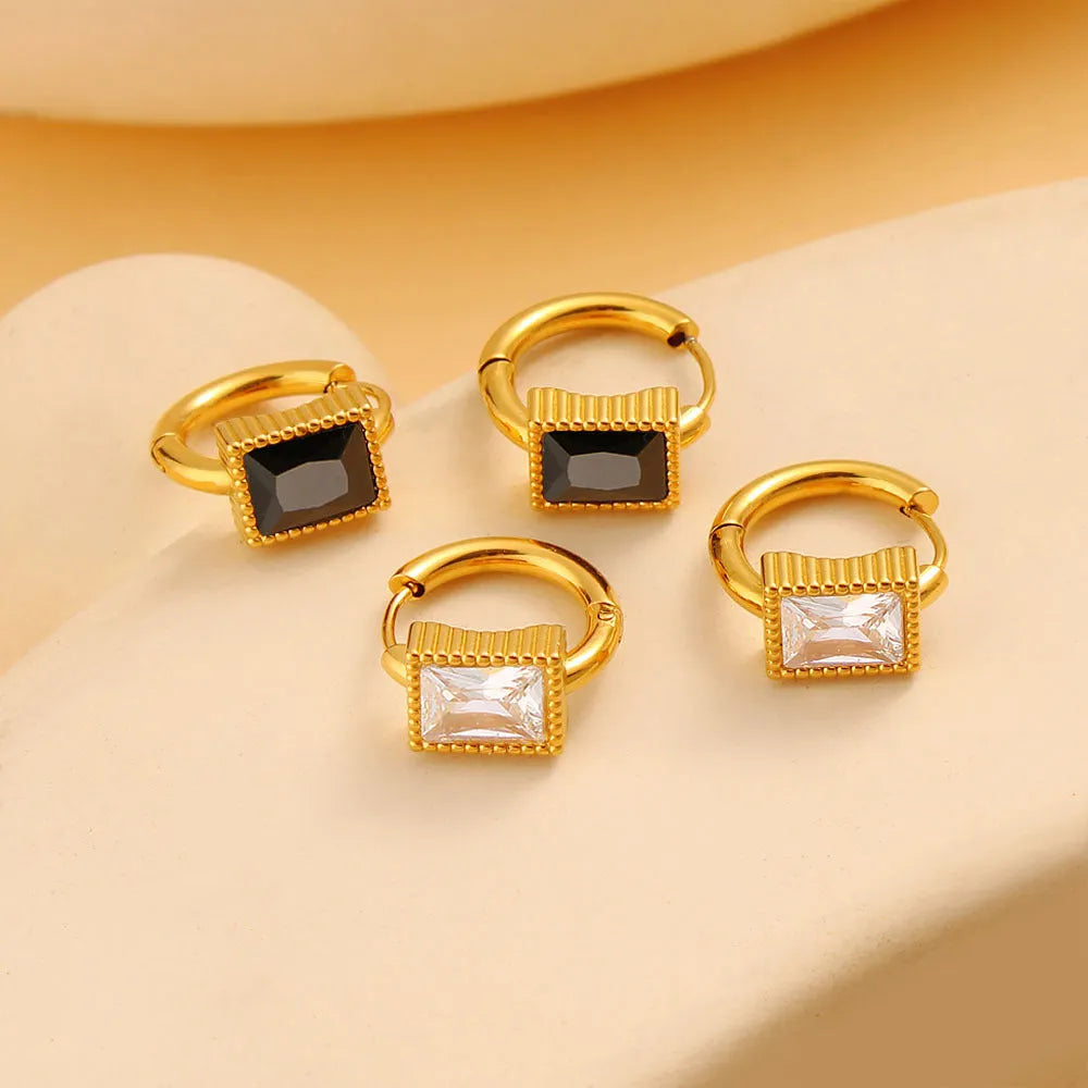 Geometric square zircon stud earrings with a round ring element on stainless steel, in white, black, or green.