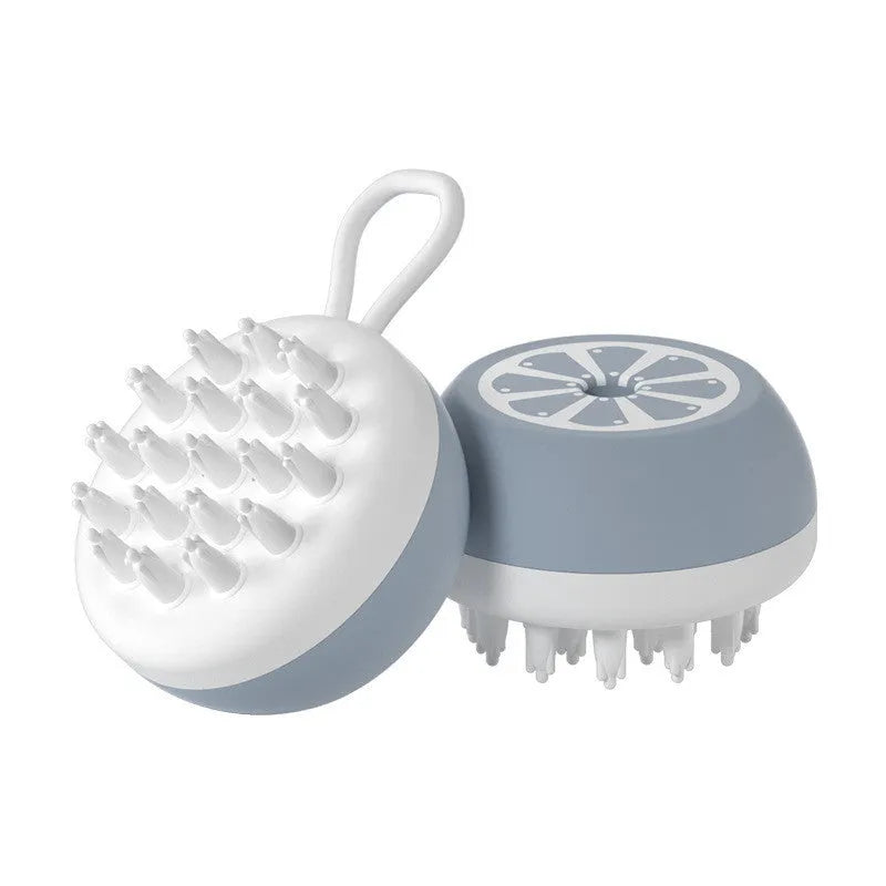 Yellow silicone pet bath brush with interchangeable heads for dog and cat grooming during washing