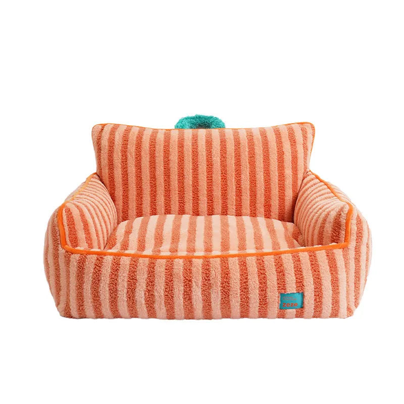 Striped orange plush fabric dog bed with a removable cover.