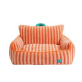 Striped orange plush fabric dog bed with a removable cover.