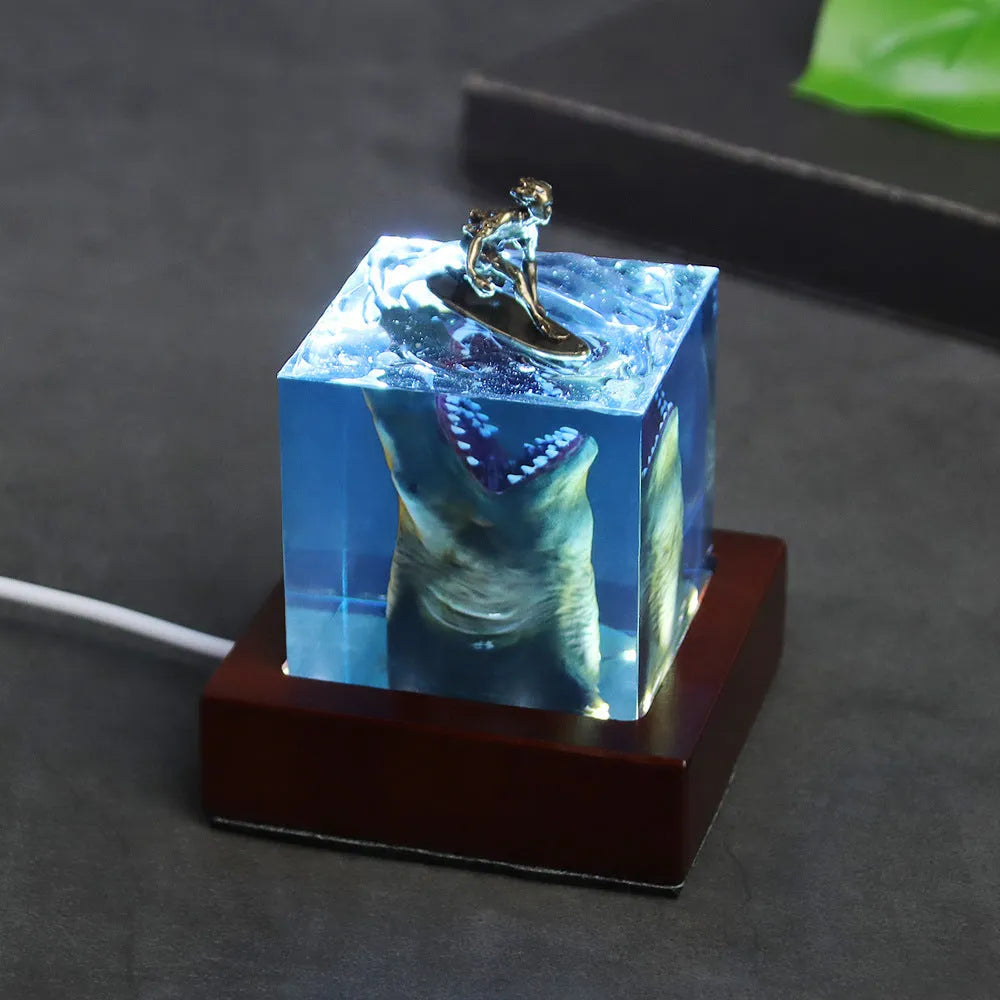 Crystal clear epoxy resin shark surfing night light ornament in modern minimalist style
