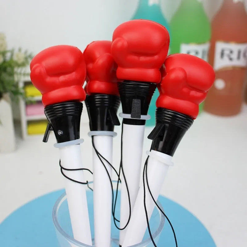 Four boxing press ejection pens showing push-button fidget mechanism and 0.7mm writing tips