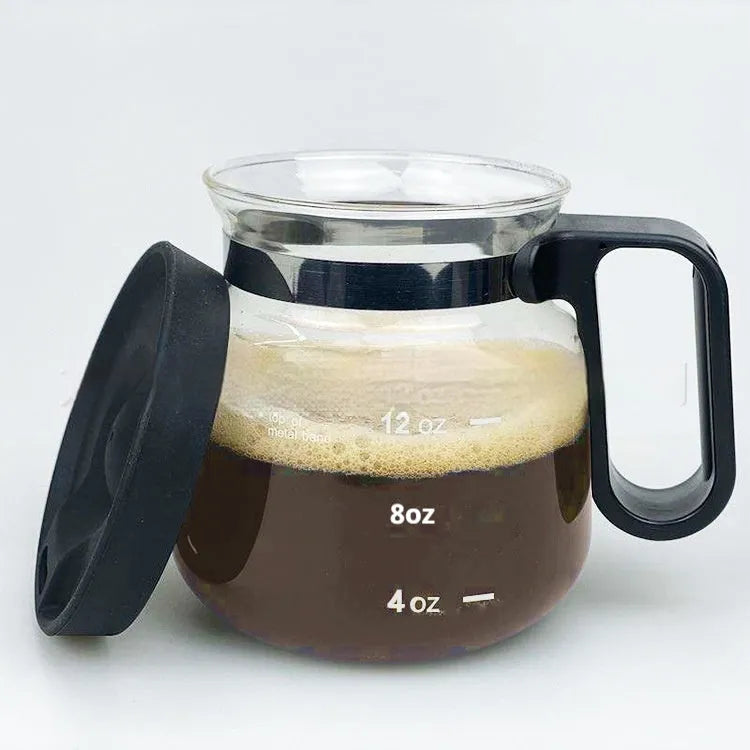 Transparent borosilicate glass coffee maker with silicone cover showing modern simple style