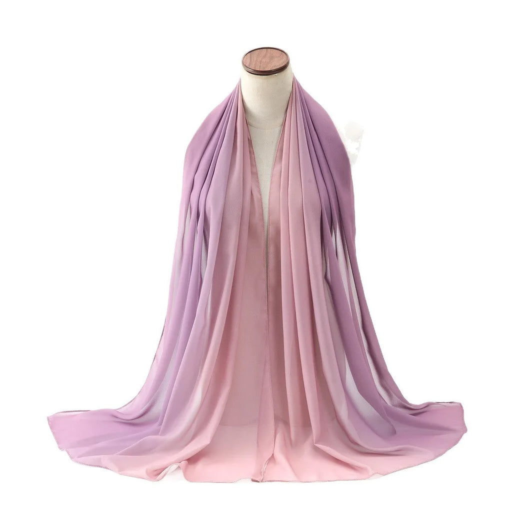 Long light blue chiffon scarf draped showing its 175cm length and 70cm width.
