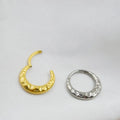 Titanium alloy concave-convex nose ring with carving detail in gold or silver colour.