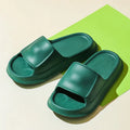 EVA flip-flop slippers with a non-slip sole pattern, shown in multiple colours including black, pink, and white.