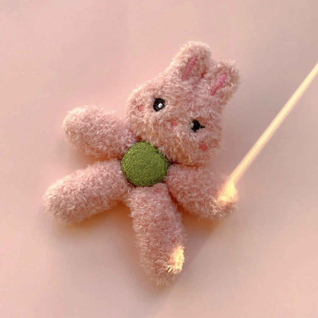 Soft stuffed catnip ball toy in animal design for chewing and play.