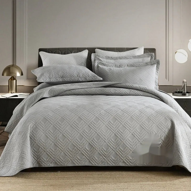 Pure cotton bedding set with damascus pattern showing embroidery details and quilted finish on bed