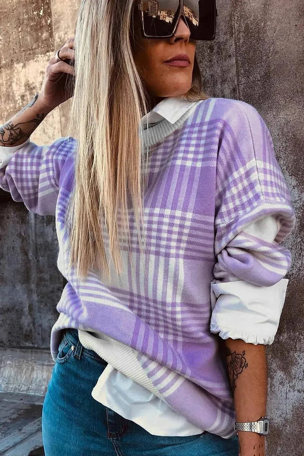 Lilac plaid print loose sweater with ribbed trim on mannequin