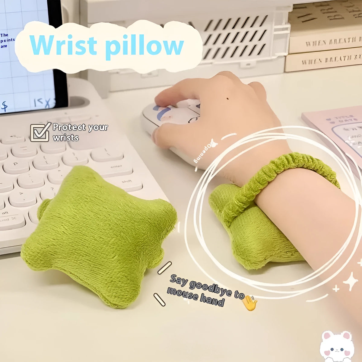 Plush mouse pad wrist protector pillow in blue colour on desk with keyboard