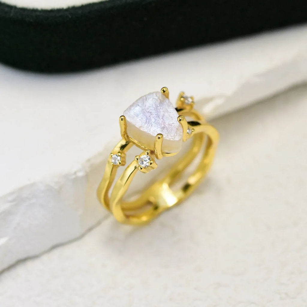 S925 sterling silver ring with triangular geometric design and central moonstone in gold tone plating
