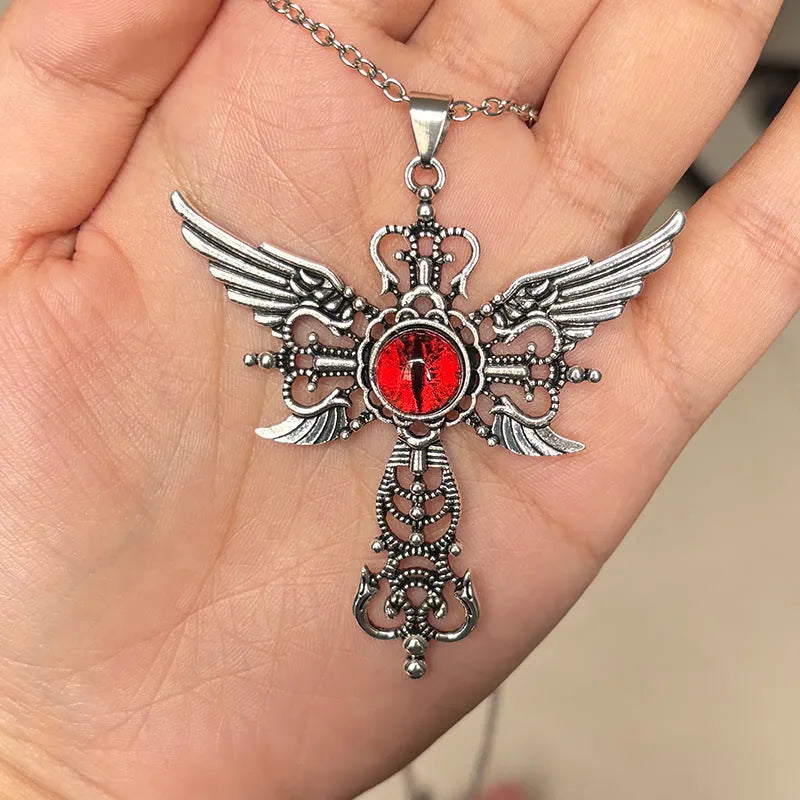 Geometric devil wings and cross alloy pendant necklace on a chain in blue colour.
