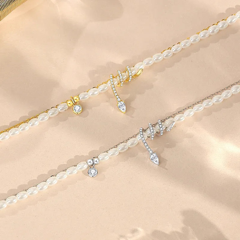 Pearl snake bracelet in 925 silver with geometric beaded design and electroplated gold finish