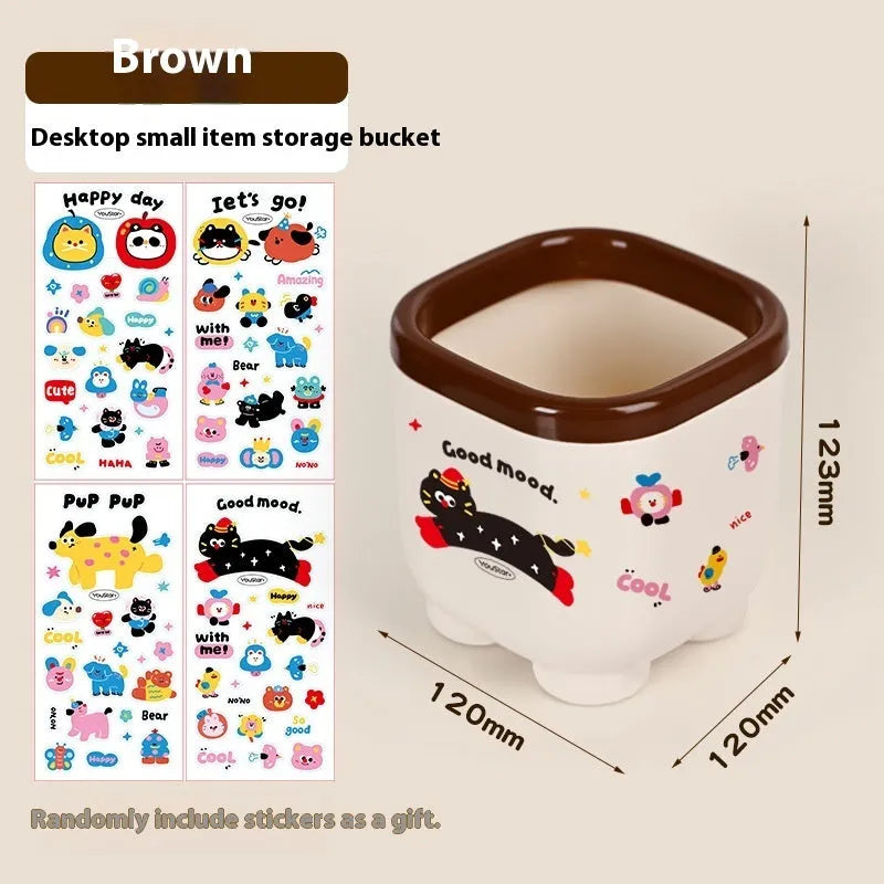 Plastic desktop storage box with cartoon stickers showing 2L capacity for stationery organisation