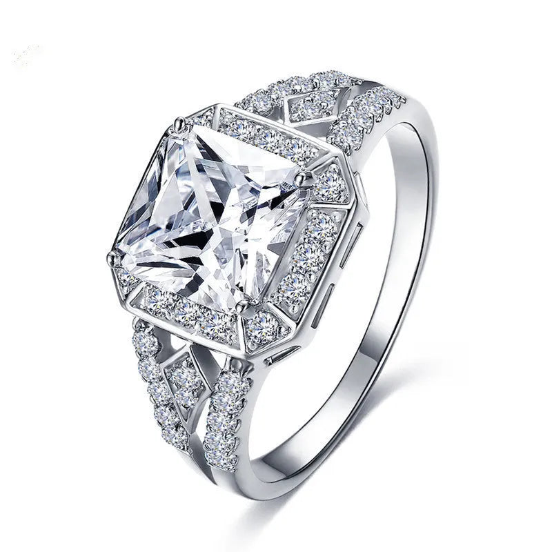 Platinum colour geometric women's ring with hollow design and inlaid zircon stones