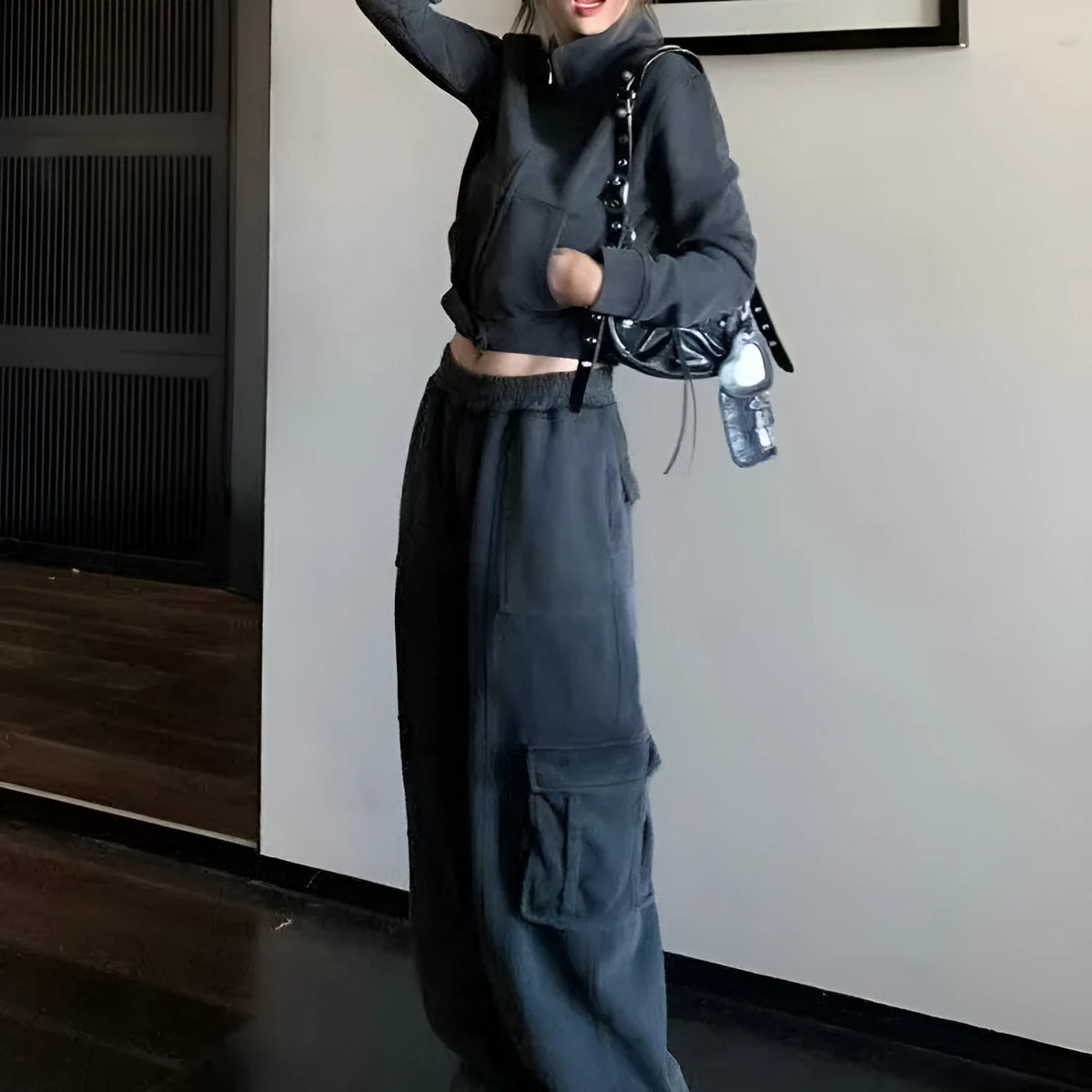 Women's two piece tracksuit set in dark gray or brown, polyester top and trousers with splicing detail