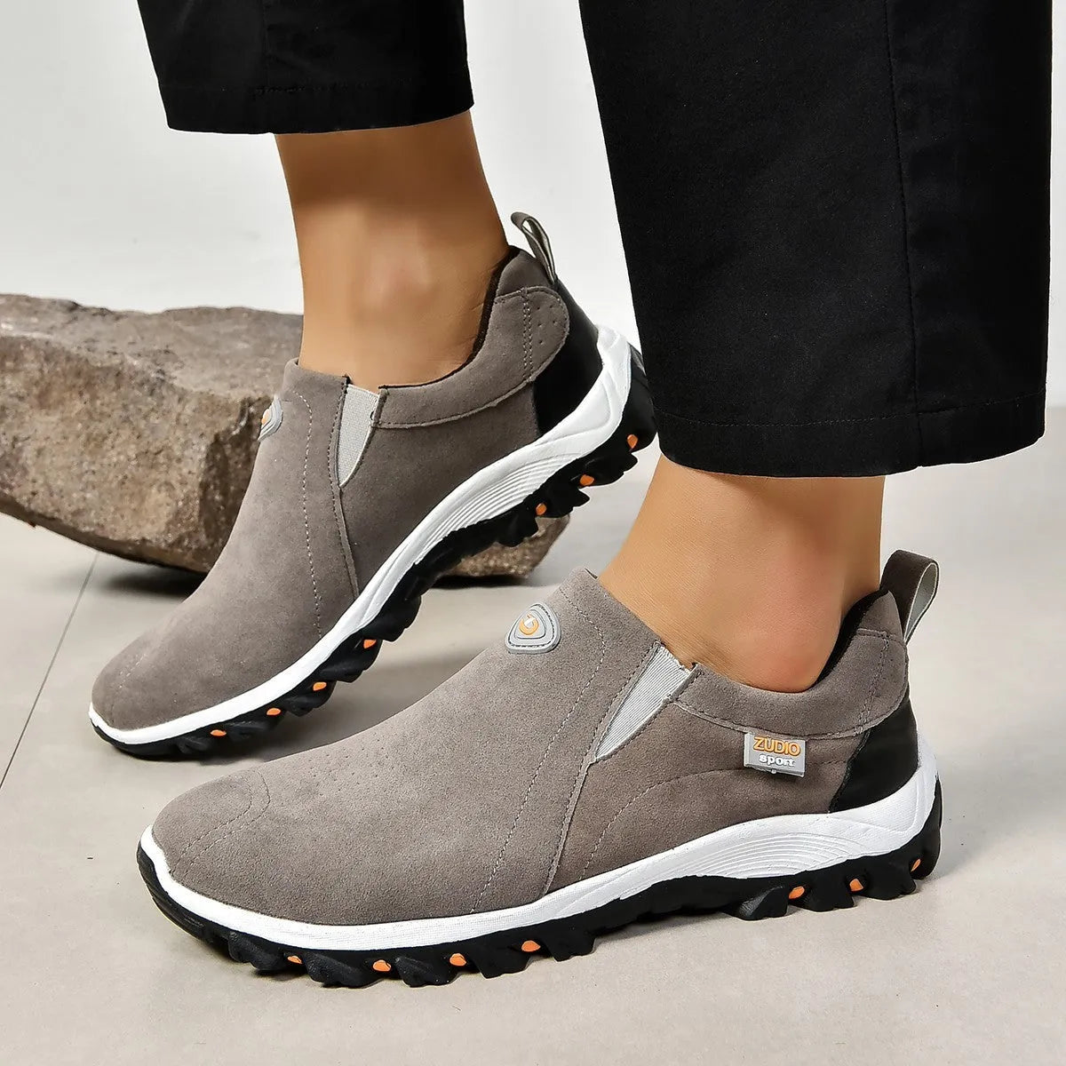 Men's round toe thin casual shoe in multiple colours on a white background.