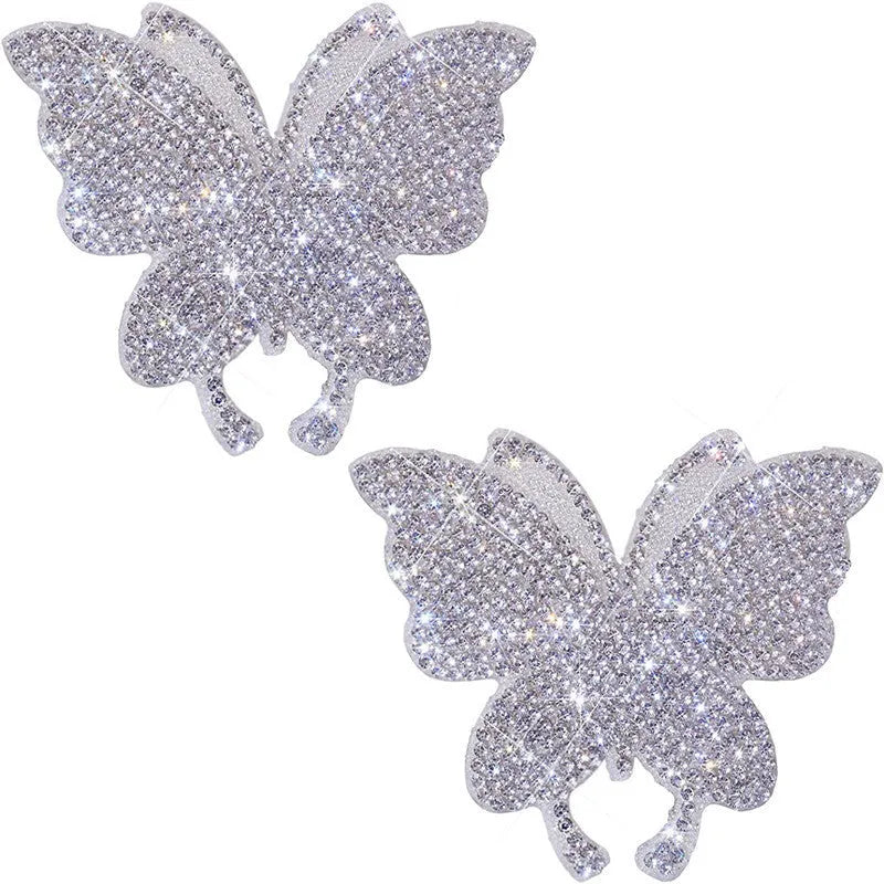 Glass car sticker decal showing bear paw or butterfly design choice on clear background.