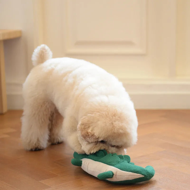 Green plush toy dog with interactive features, shown with scale indicating 35 cm length.