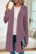A loose-fit long sleeve knitted cardigan jacket in grey with front pockets.