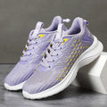 Women's lavender purple and blue Flyknit running shoes with mesh lining and striped pattern.
