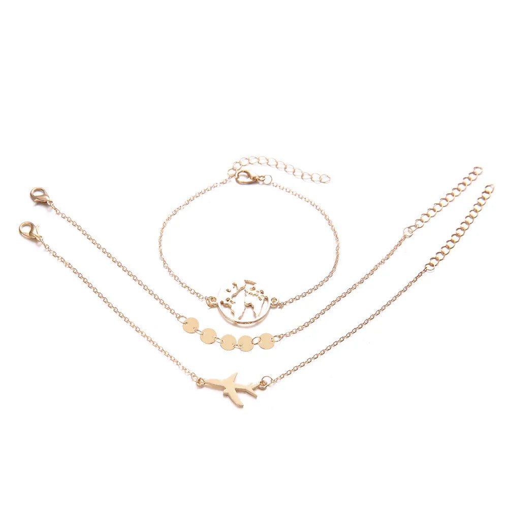 Three women's bracelets with heart-shaped aircraft map charms in bohemian style