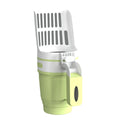 Grey cat litter scoop attached to a lidded waste bin with a foldable bottom and non-slip handle.