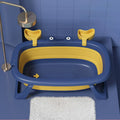 Blue foldable plastic pet bath tub for small dogs and cats on a plain background.
