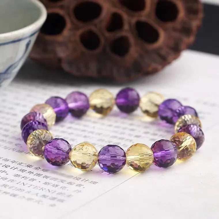128-facet crystal ametrine bracelet with zodiac designs in multiple bead sizes