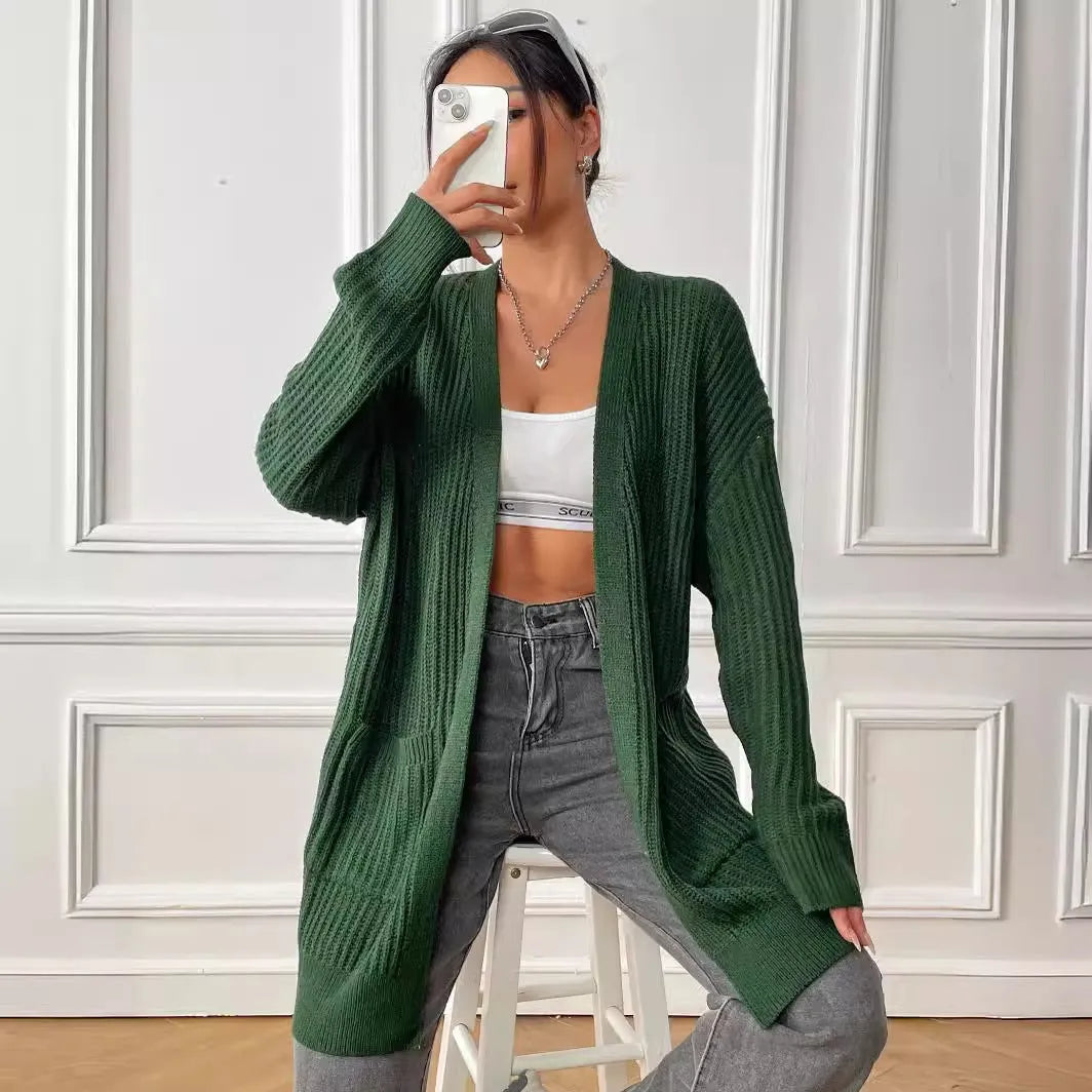 Womens double pocket acrylic cardigan in dark green colour showing mid-length design and loose fit