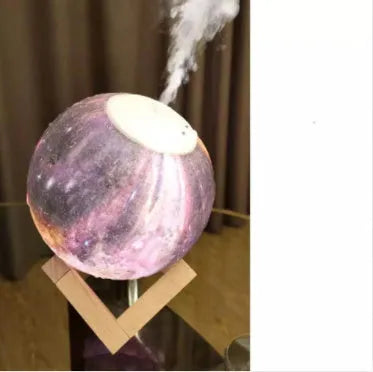 Lunar-shaped humidifier night light with 13cm diameter PVC ball, showing clean white LED illumination