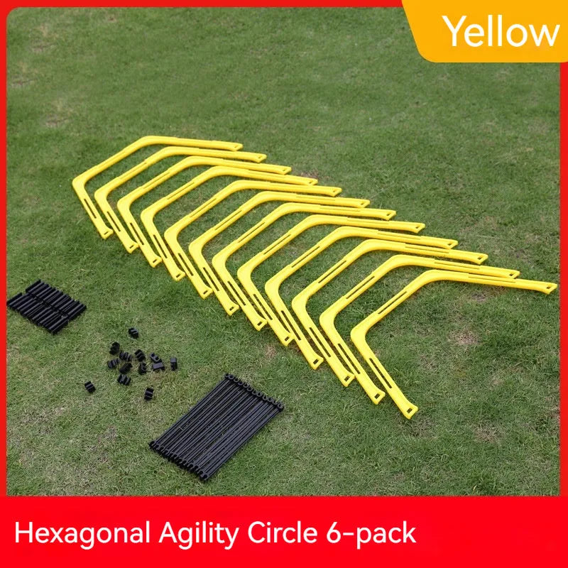 Set of six foldable yellow, green, and orange plastic hexagon football agility training rings laid out on grass.