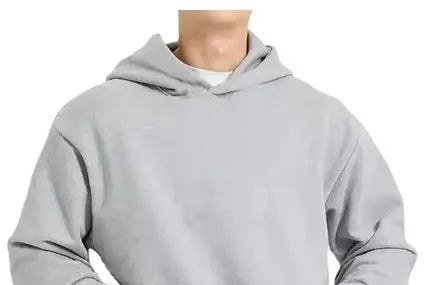Man wearing a solid colour fleece-lined cotton pullover hoodie with a wool lining.