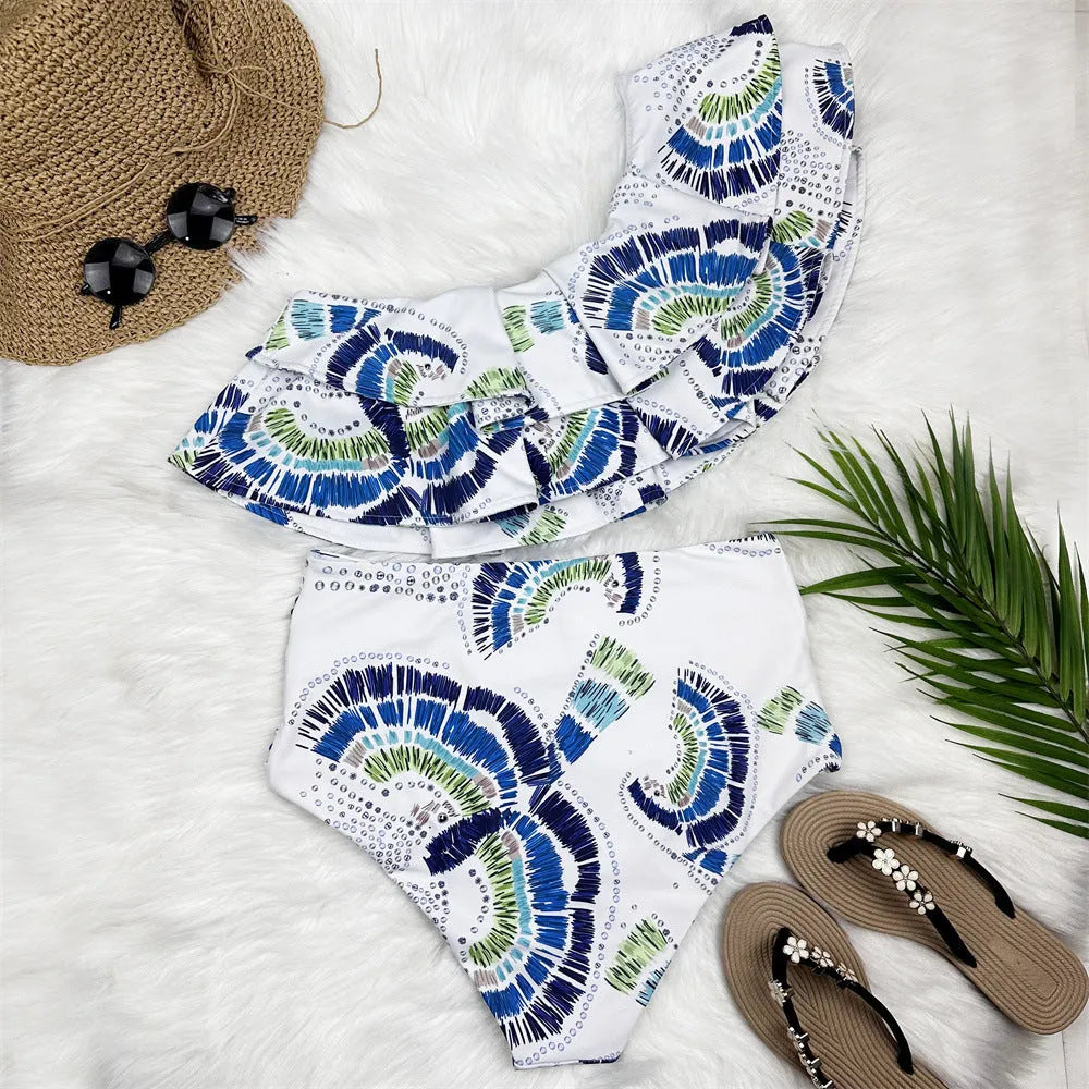 White women's one-shoulder swimsuit with double-layer skirt showing side split design