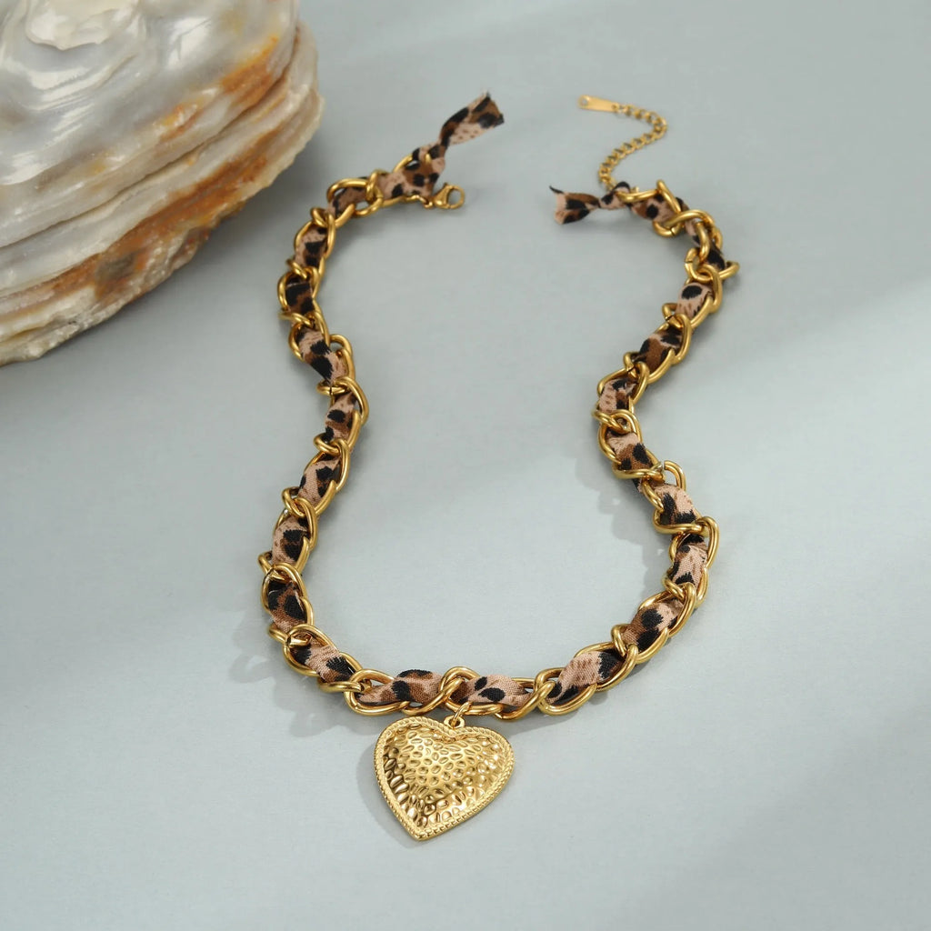 Geometric leopard love pendant stainless steel necklace with gold electroplated finish on adjustable chain