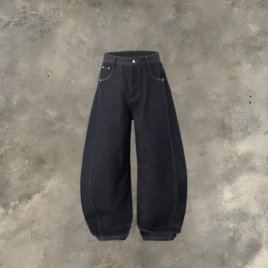 Men's wide-leg denim trousers in original cow colour, showing relaxed fit and mid-waist design.