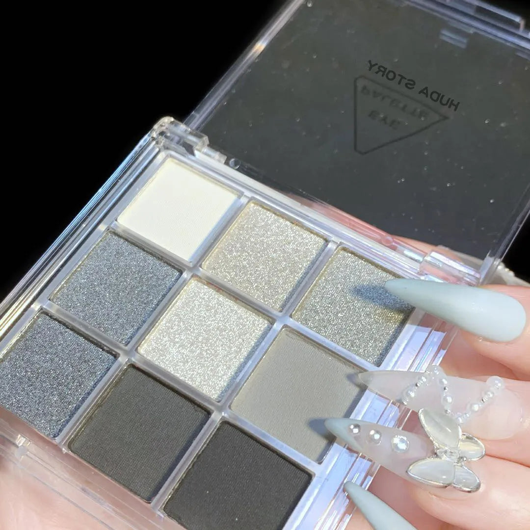 CZ0069 9-colour smoked eyeshadow palette compact showing white, silver, black, and iron grey shades.